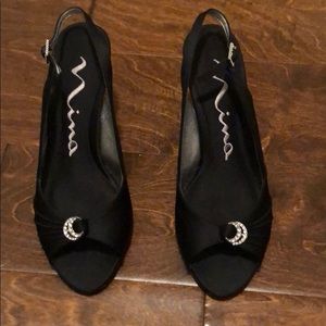 Nina black sling back heels with moon